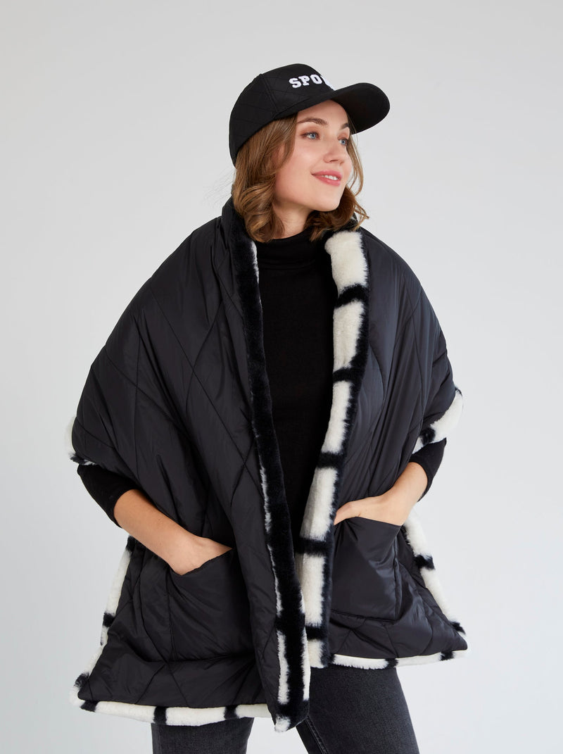 Model showing pockets of Shiraleah Malena Puffer Wrap, Black