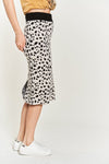 Side view of black and white midi skirt