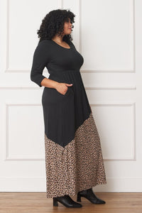 model showing pockrt of Asymmetrical Leopard Accent Maxi Dress