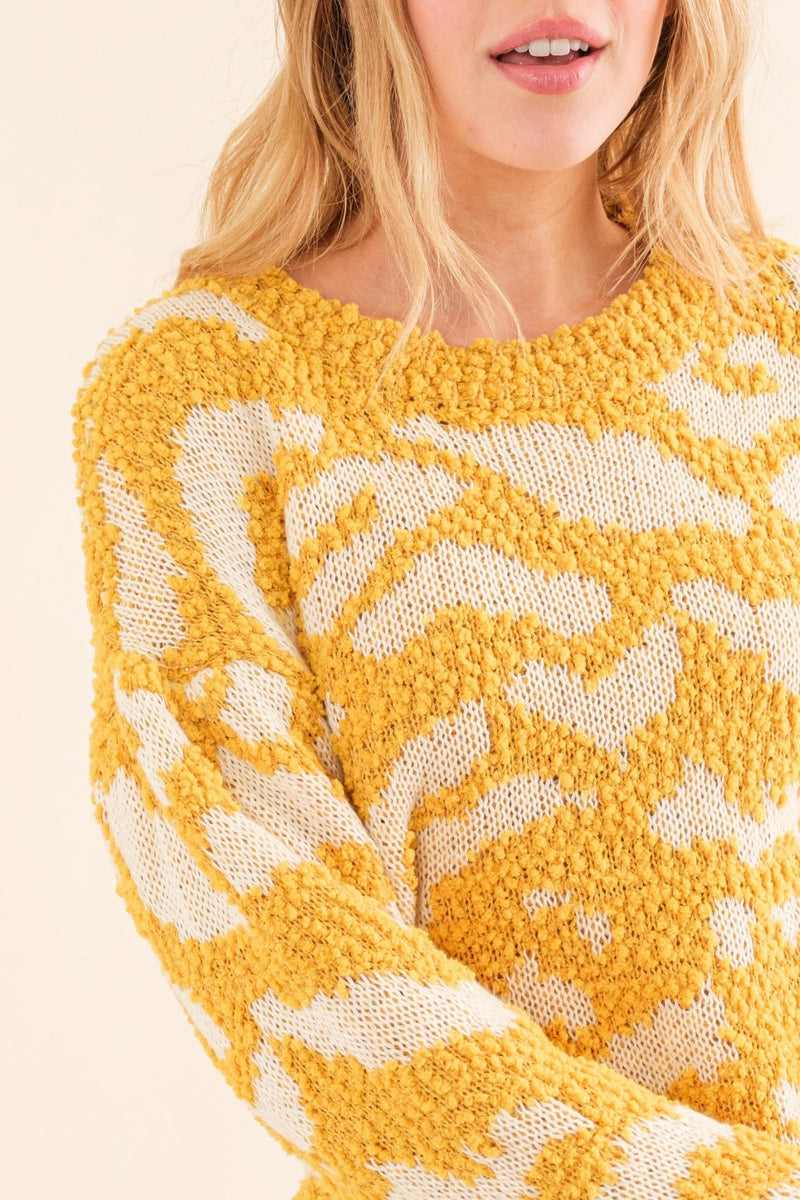 Close up view of And The Why Full Size Textured Pattern Contrast Sweater