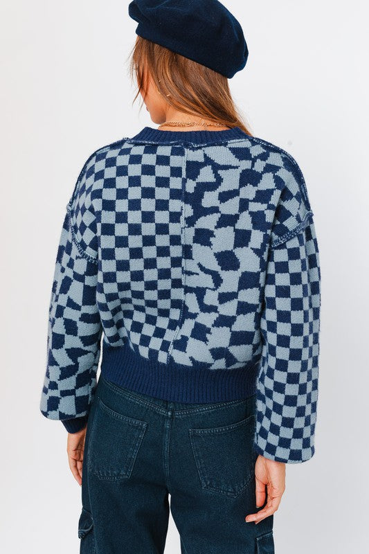 LONG SLEEVE CHECKER BOARD SWEATER