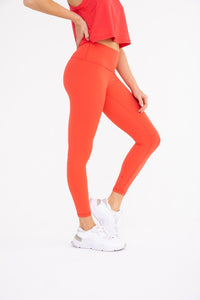 Side view of orange Manhattan Ultra Form Fit Leggings