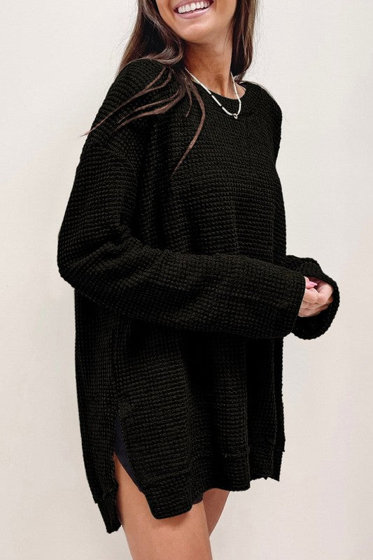 left side view of Waffle Knit Drop Sleeve Side Slits Oversized Top black