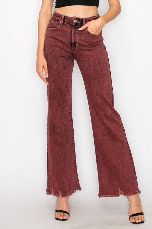 Model showing pocket of PLUS SIZE - HIGH RISE FLARED LEG JEANS