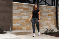 Lady walking wearing Army Camo Leggings