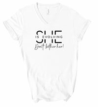 popular V-Neck She Is Evolving Graphic Boutique Tee