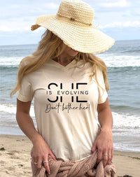 V-Neck She Is Evolving Graphic Boutique Tee