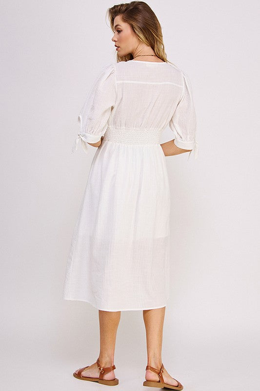 Back of 3/4 PUFF SLV TEXTURE VNECK BUTTON DOWN MIDI DRESS