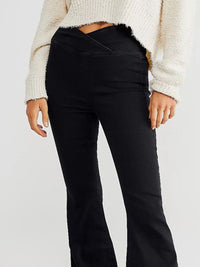 Close up view of Asymmetric Waist Flare Jeans