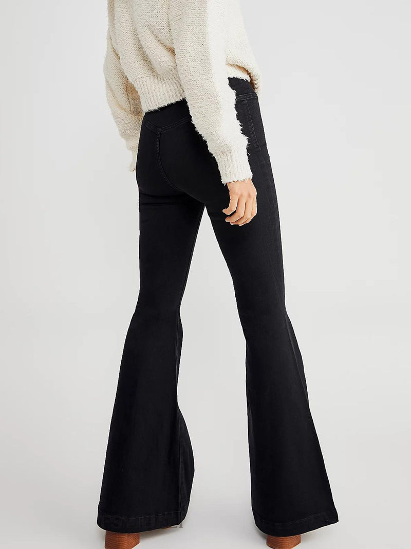 View of the back of Asymmetric Waist Flare Jeans