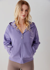 Model showing pockets on Bunny Crop Zip-up Hoodie