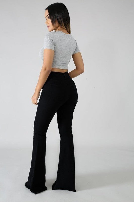 Model showing the left side of Bell Bottom Jean in Black