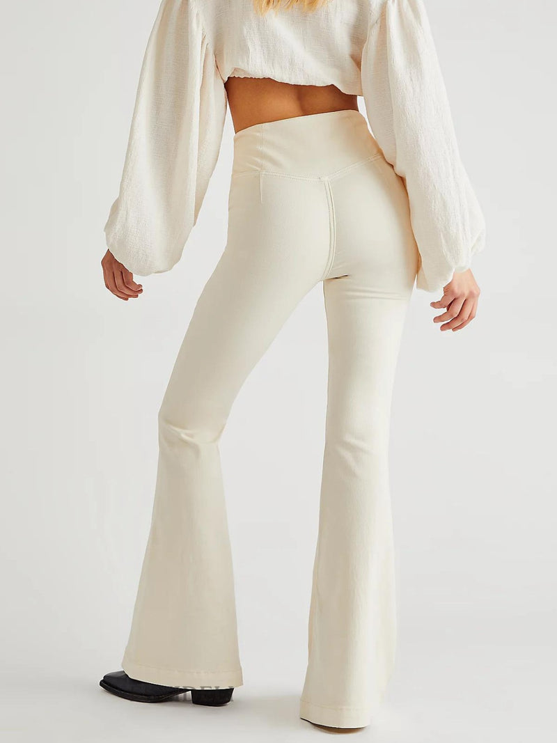 Back view of white Asymmetric Waist Flare Jeans