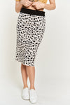 Zoom in view of black snd white midi skirt