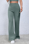 Front view of green Basic Bae Full Size Ribbed High Waist Flare Pants