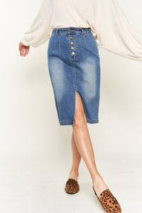 Model showing front split in the Denim button down front midi skirt 