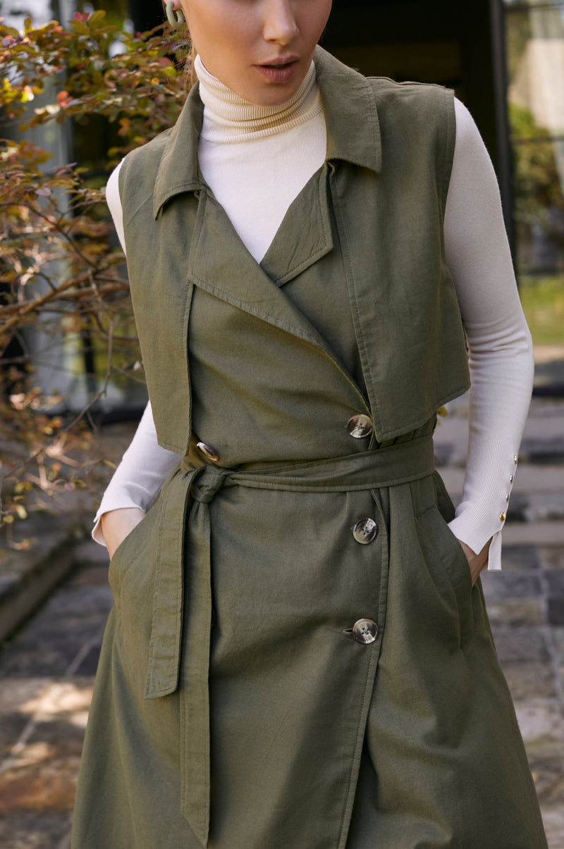 Close up of green Arden Belted Vest Trench 