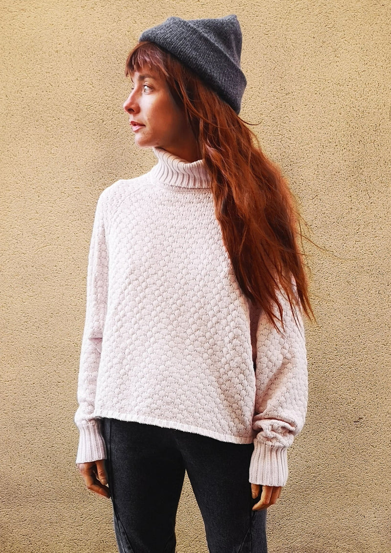 left side view of woman in SWEATER TURTLENECK - KNIT PEARL beige