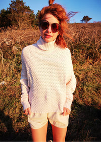 front view of woman outside in SWEATER TURTLENECK - KNIT PEARL beige