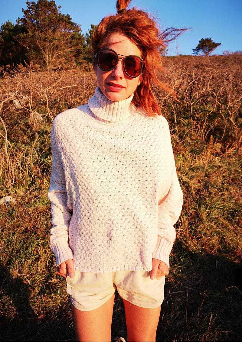 front view of woman outside in SWEATER TURTLENECK - KNIT PEARL beige