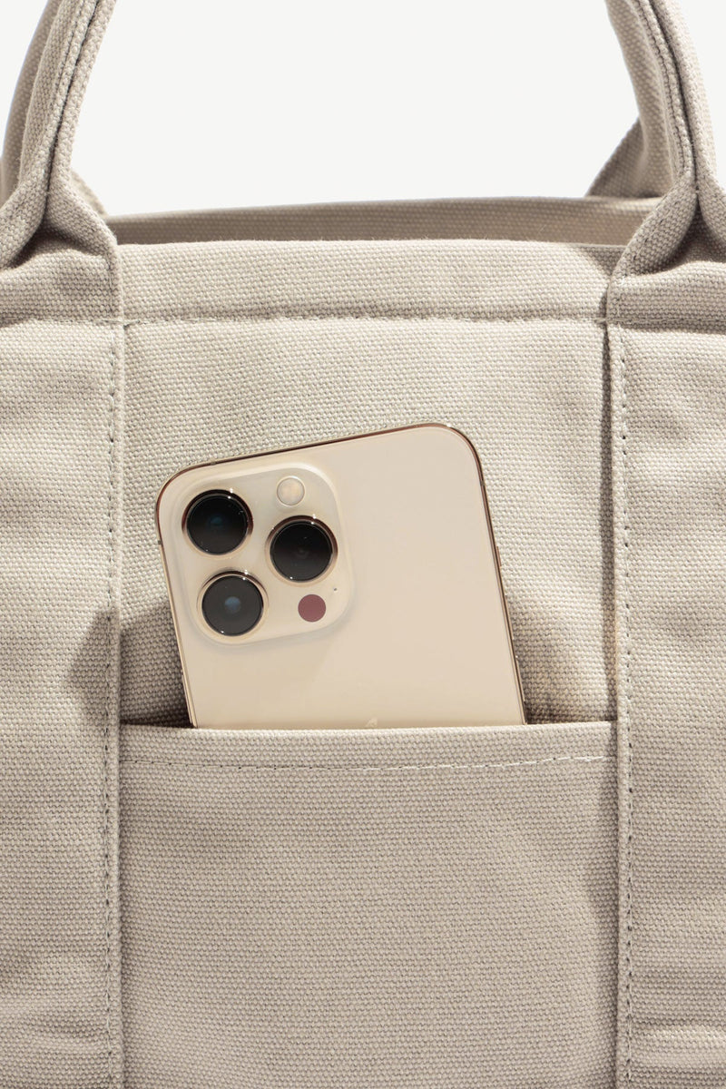 cell phone pocket of the Sloane Tote - Taupe