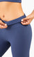 Model showing wast line of Ribbed Mid Waist Leggings