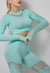 Model showing elastic waistband of Mesh Stitching Long Sleeve Sports Top & Leggings Two-Piece Fitness Set