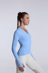 another side view of Buttery Soft Seamless Long Sleeve Active Top-blue