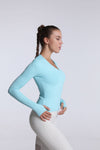 Left side view of Buttery Soft Seamless Long Sleeve Active Top-teal