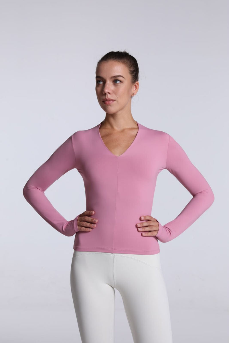 model showing front of Buttery Soft Seamless Long Sleeve Active Top-pink