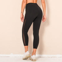 Back view of Mid Rise Mesh Paneling Leggings