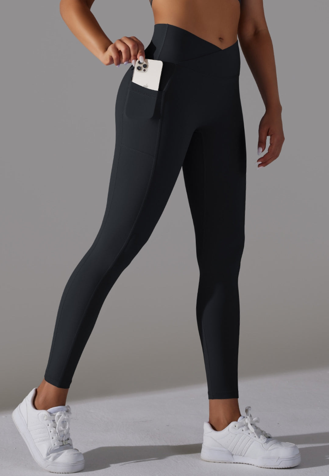 Model showing pocket on Overlap V-Waist Pocket Leggings