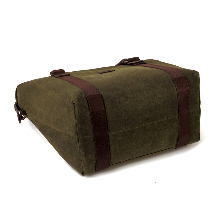 The bottom of green White Wing Waxed Canvas Large Cooler by Mission Mercantile Leather Goods