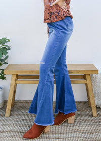 Side view of Elastic Waist Distressed Flared Long Bell Bottom Denim Jeans