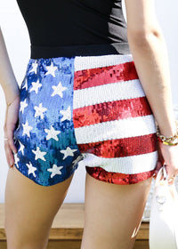 Back view of Anna-Kaci Women's Mid Rise July 4th USA Flag Star Stripes Sparkly Sequin Shorts