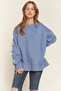 Close up of blue Be Yourself Sweatshirt