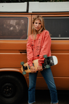 Girl posing in front of a 60's van wearing Peanuts Joe Cool Snoopy Sweatshirt 