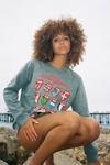 Model showing  off Rolling Stones World Tour Fleece Sweatshirt at the beach