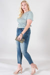 DISTRESSED MID RISE SKINNY WITH STEP HEM