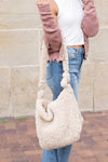 MODEL SHOWING FULL PIC OF Boucle Sherpa Messenger Bag