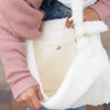 Model showing inside of white Boucle Sherpa Messenger Bag