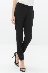 Zoom in view of Ro & De Ankle Cuffed Black Crepe Pants In Black