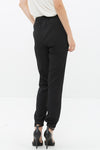 Back of Ro & De Ankle Cuffed Black Crepe Pants In Black