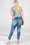 DISTRESSED MID RISE SKINNY WITH STEP HEM