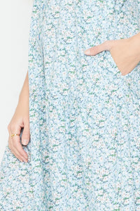 Close up view of pocket on BUTTON TIER MIDI DRESS