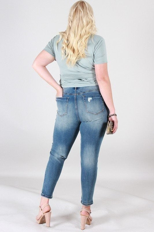 DISTRESSED MID RISE SKINNY WITH STEP HEM