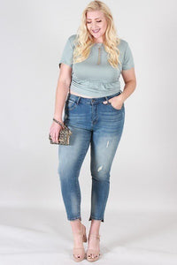 DISTRESSED MID RISE SKINNY WITH STEP HEM