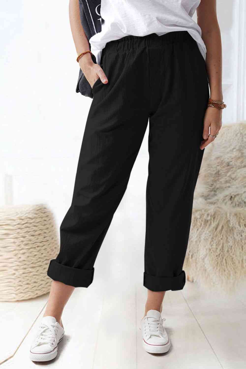 Model showing pocket of Paperbag Waist Pull-On Pants with Pockets-black